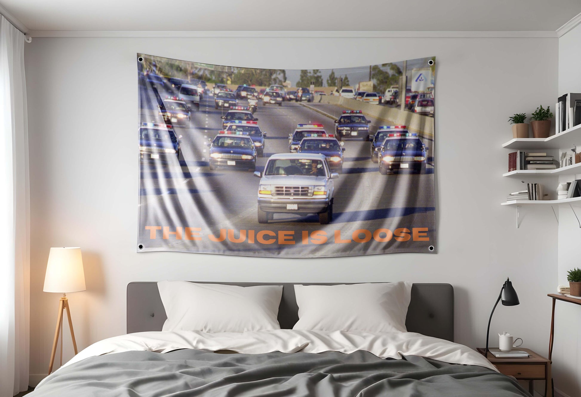 OJ Simpson driving his bronco down the freeway with police chasing him "The Juice is Loose" flag Hung up in a dorm room